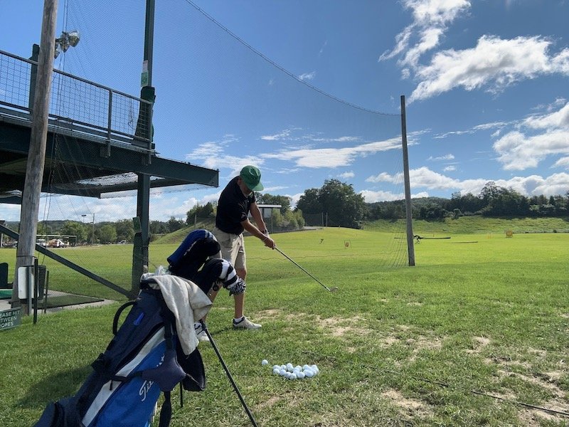 Block practice at the driving range